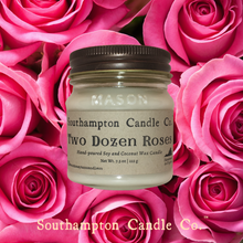 Load image into Gallery viewer, Up close photo of 8 ounce candle in 'Two Dozen Roses (TM)' candle by Southampton Candle Company, with pink rose backgrond.