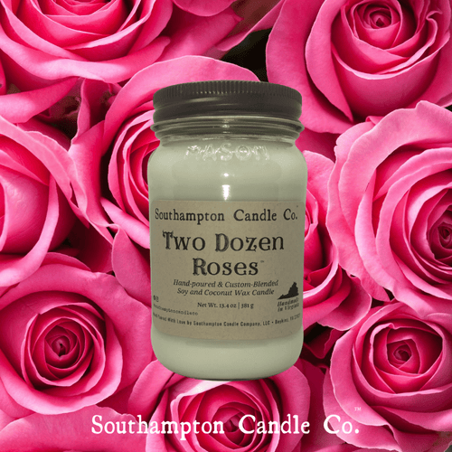 Close-up photo of 16 ounce candle with 'Two Dozen Roses' fragrance label by Southampton Candle Co.